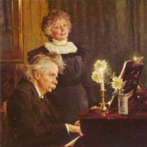 Edvard Grieg and Nina Hagerup, his wife, making music in the evening
